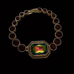 Heidi Daus "On-Line" bracelet aurora borealis center stone red crystals